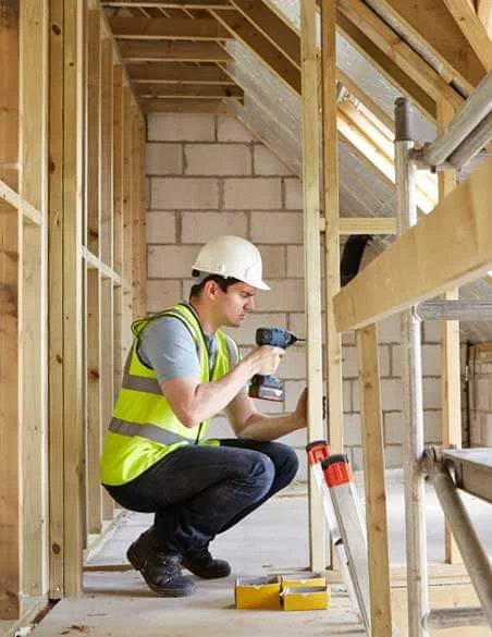 Sapphire carpenter working on a commercial repair