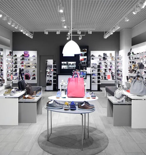 Retail display tables in a refitted store