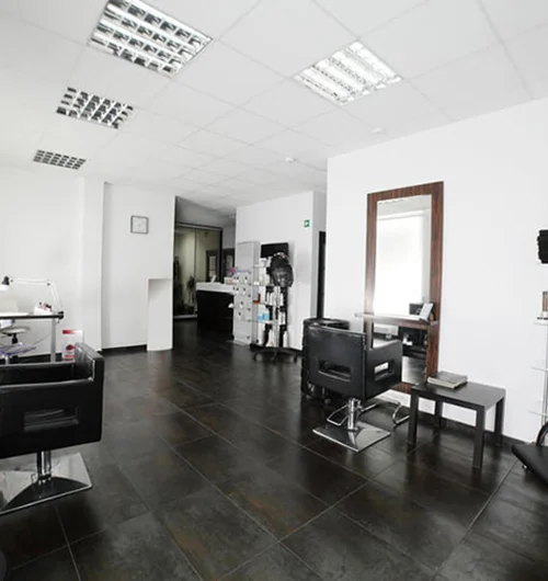 Salon interior refurbished with new flooring and mirrors