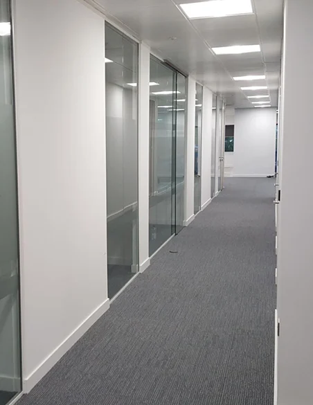 Office corridor with new partitioning and carpet